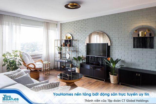 Căn hộ tầng cao sở hữu vẻ đẹp yên bình, giản dị - Ảnh 1. Phòng khách của căn hộ