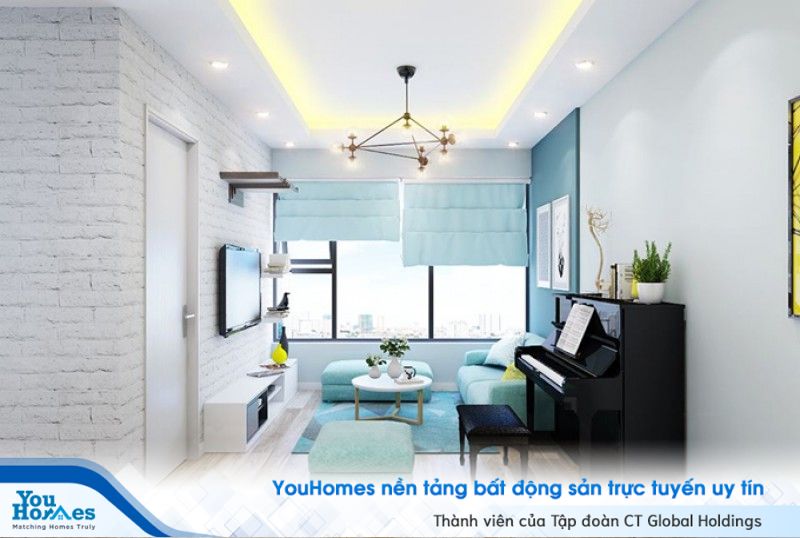 Bộ bàn ghế có gam màu xanh nhạt, rèm cửa và thảm tông-xuyệt-tông đã tô điểm cho phòng khách và bức tường gạch thô trắng khiến chúng ta có cảm giác lúc nào cũng muốn trở về nhà.