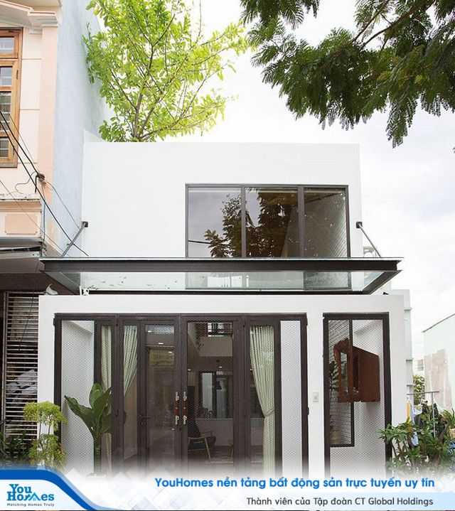 Nhà phố 2 tầng khoảng 1 tỷ đẹp mê mẩn với thiết kế gây ấn tượng mạnh - Ảnh 1.