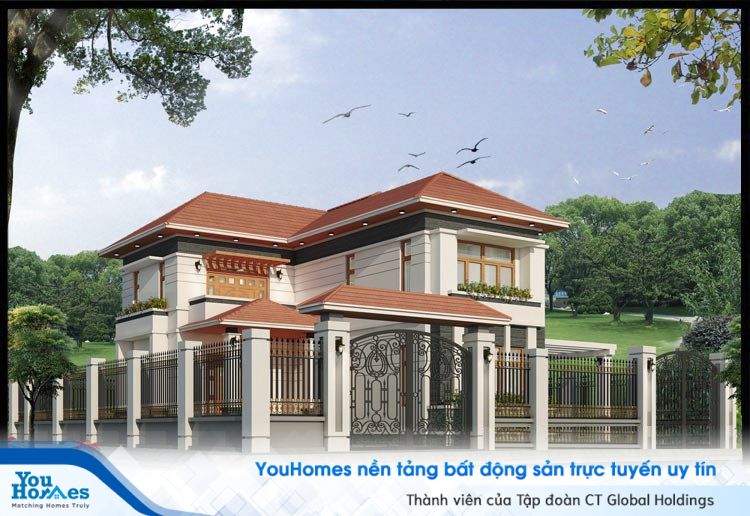 Mẫu nhà 2 tầng chữ L với sân vườn rộng và cổng ra vào kiên cố. 