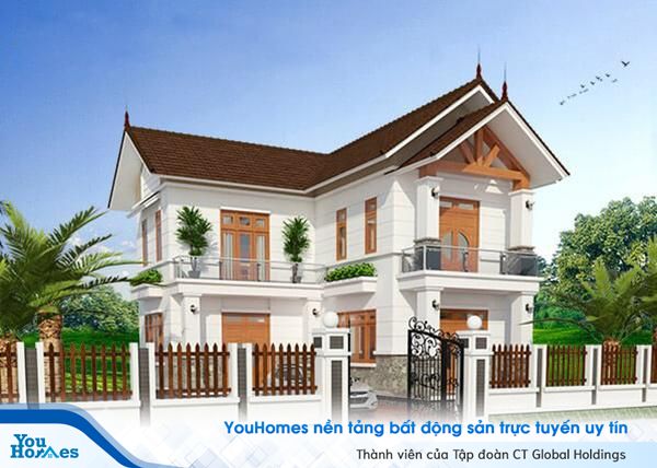 Với sự kết hợp của những cánh cửa bằng gỗ tự nhiên giúp ngôi nhà 2 tầng chữ L trở nên ấm áp.