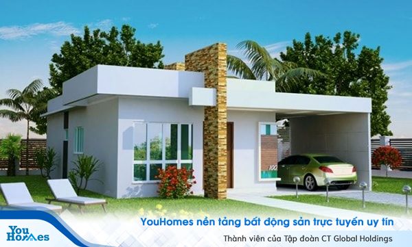 Mẫu nhà cấp 4 mái bằng ở nông thôn có gara ô tô kết hợp sân vườn rộng, giúp gia chủ có thể thư giãn thoải mái.