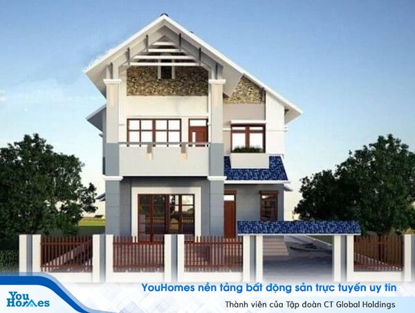 Ngôi nhà 2 tầng mái thái màu trắng nhẹ nhàng.
