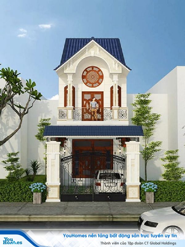 Hệ mái thái màu xanh nổi bật trên nền sơn màu trắng tươi sáng.